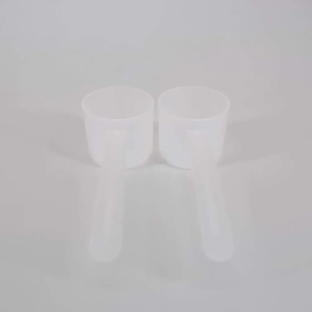 Two National Measures Transluscent Plastic Long Handle Measuring Scoops - 60 CC